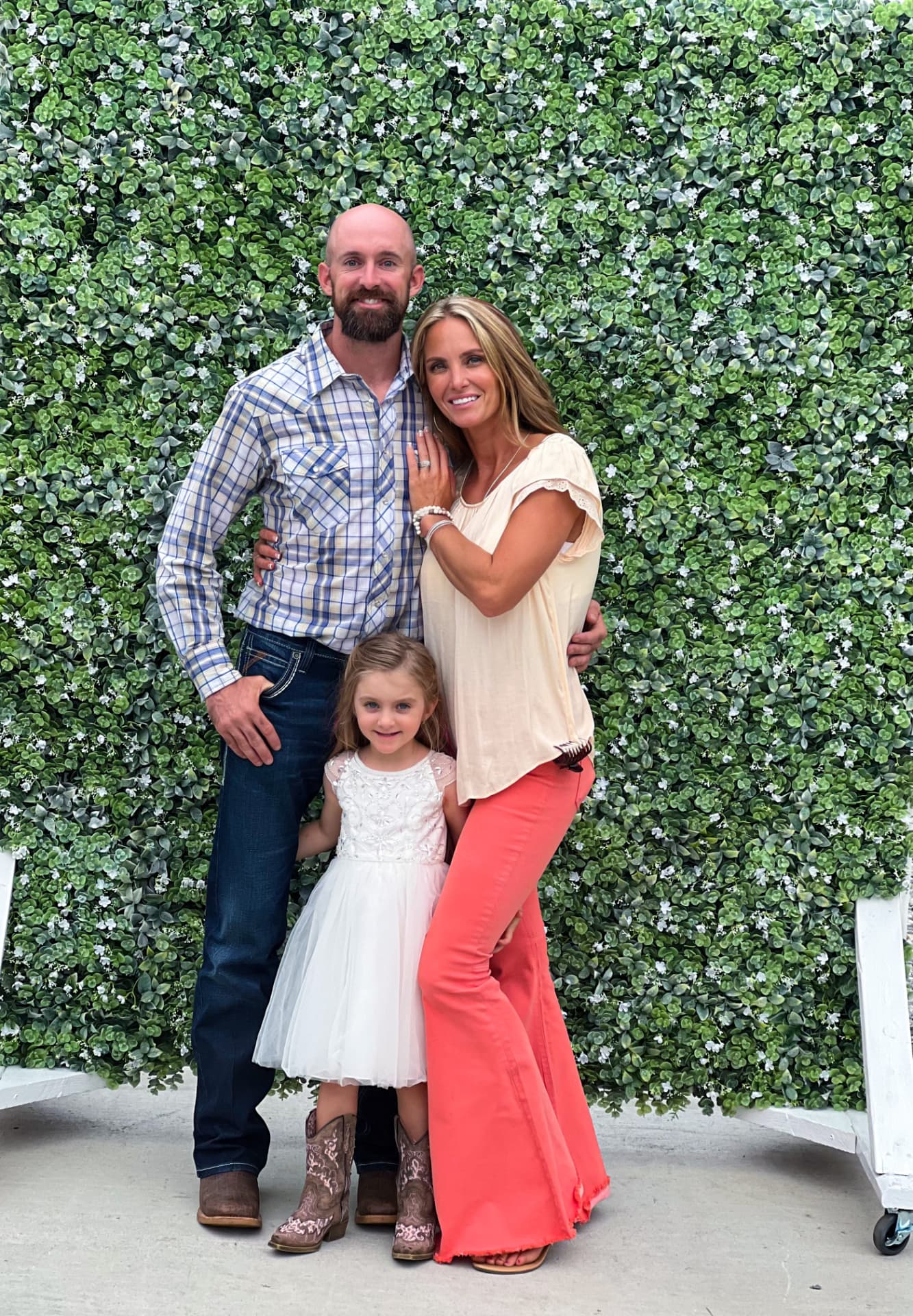 Chase Curtis, owner of C&C Tree Service, with his family
