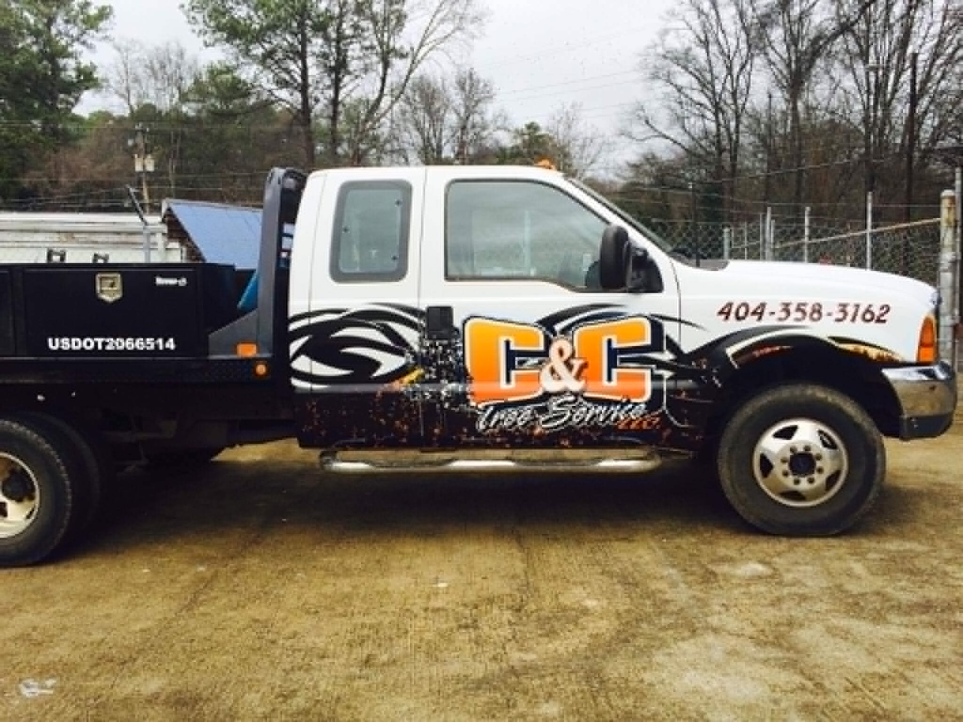 C&C Tree Service, LLC truck with company logo and phone number